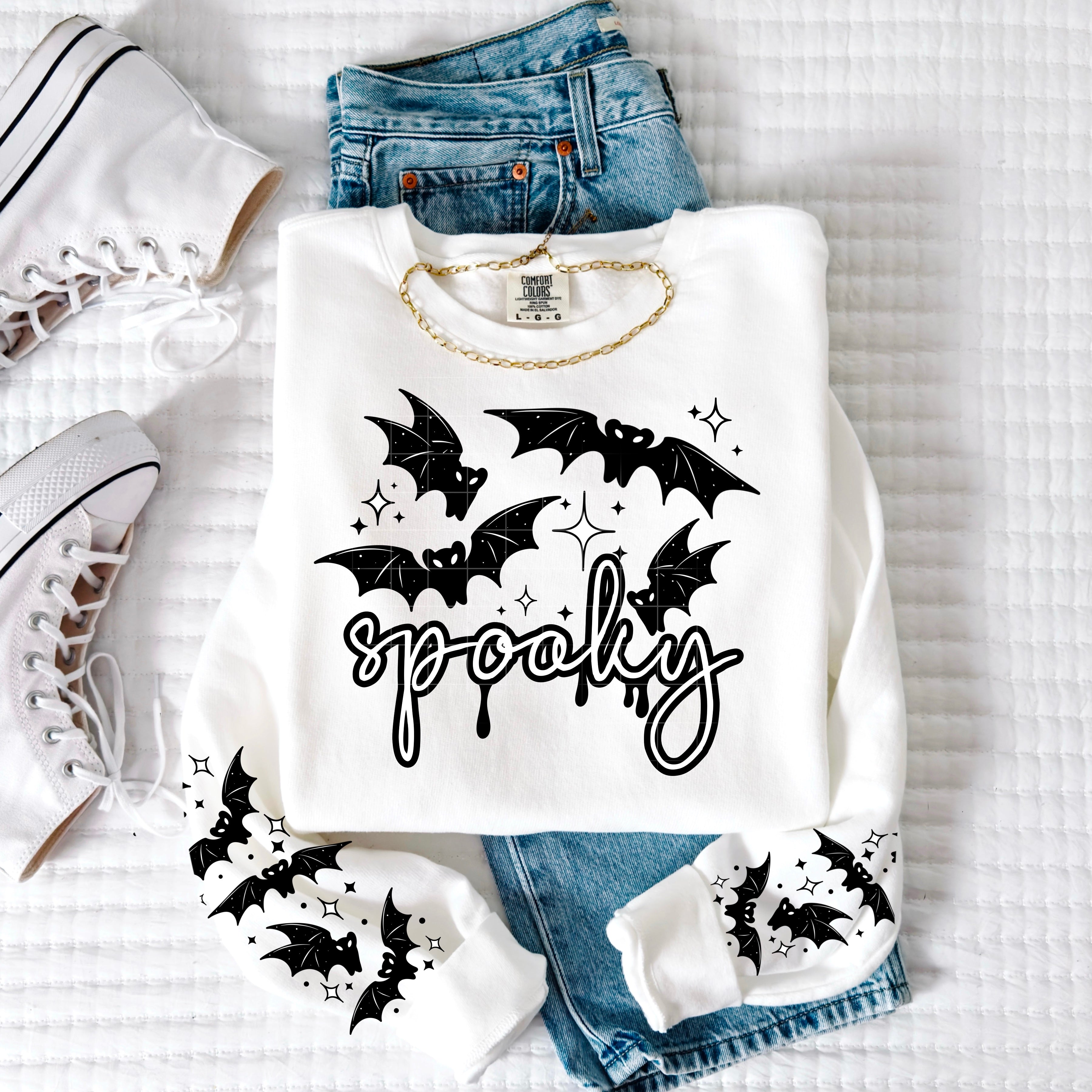 SPOOKY SWEATER WITH SLEEVE PRINTS