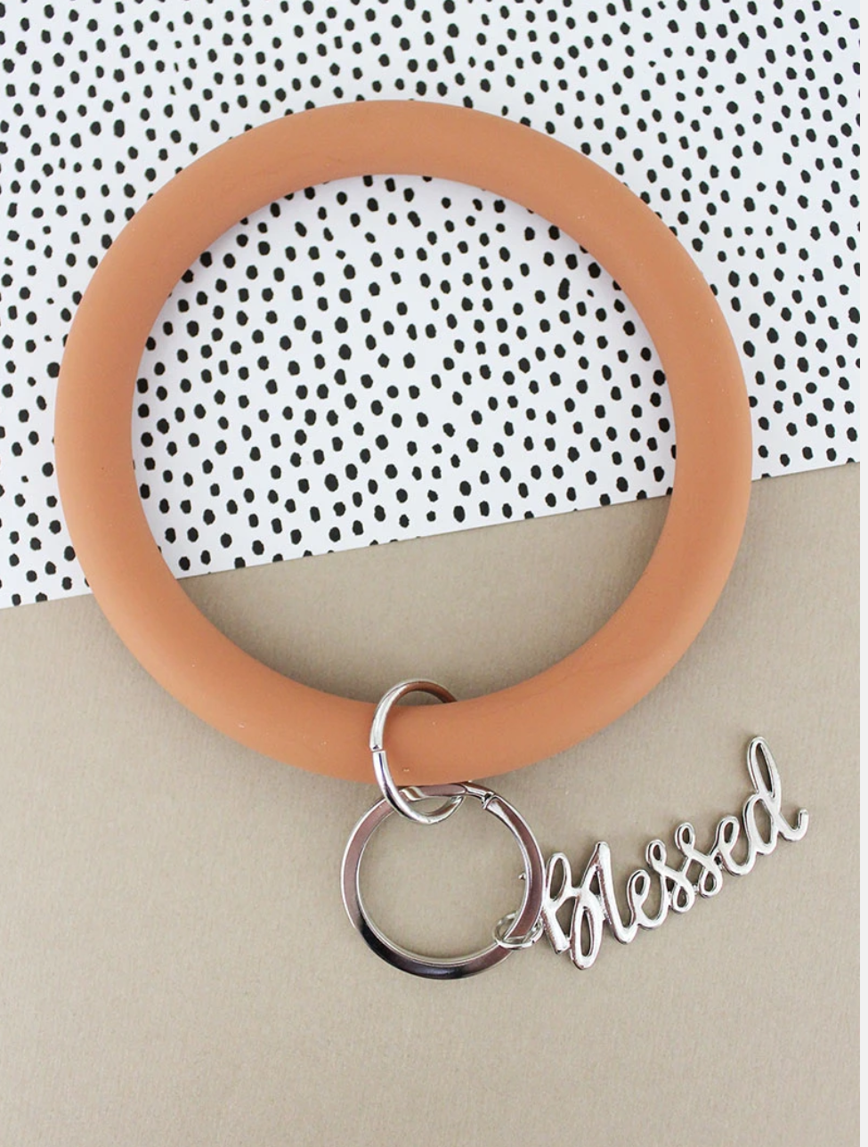 Silicone bangle with blessed charm