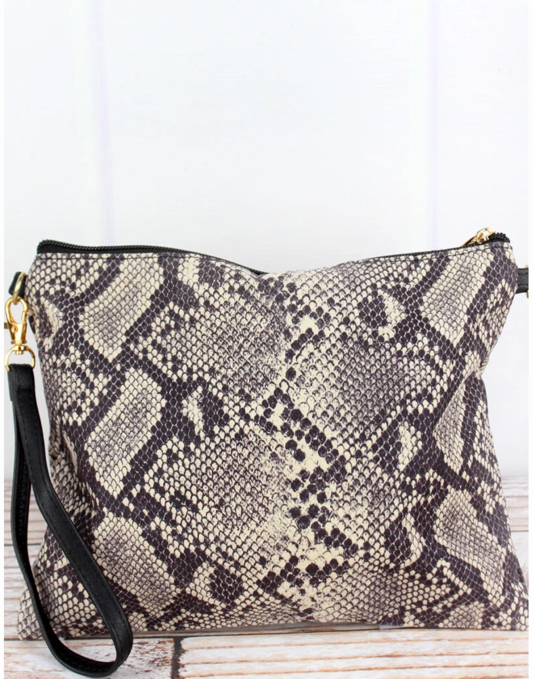 Snakeskin crossbody clutch