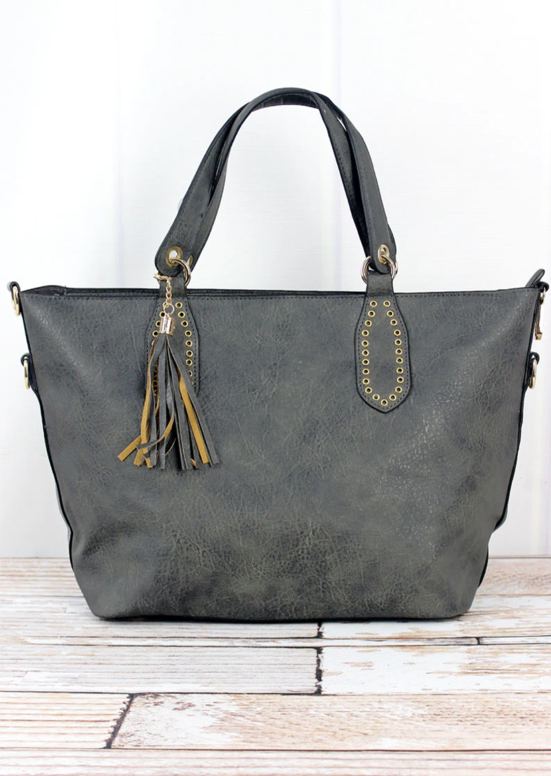 Dark grey leathee studded handle bag